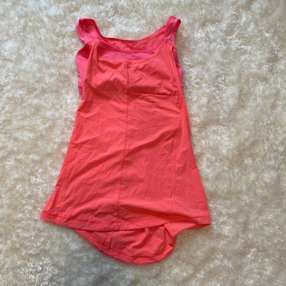 Lulu lemon, hot pink workout shirt with built in Sports bra.